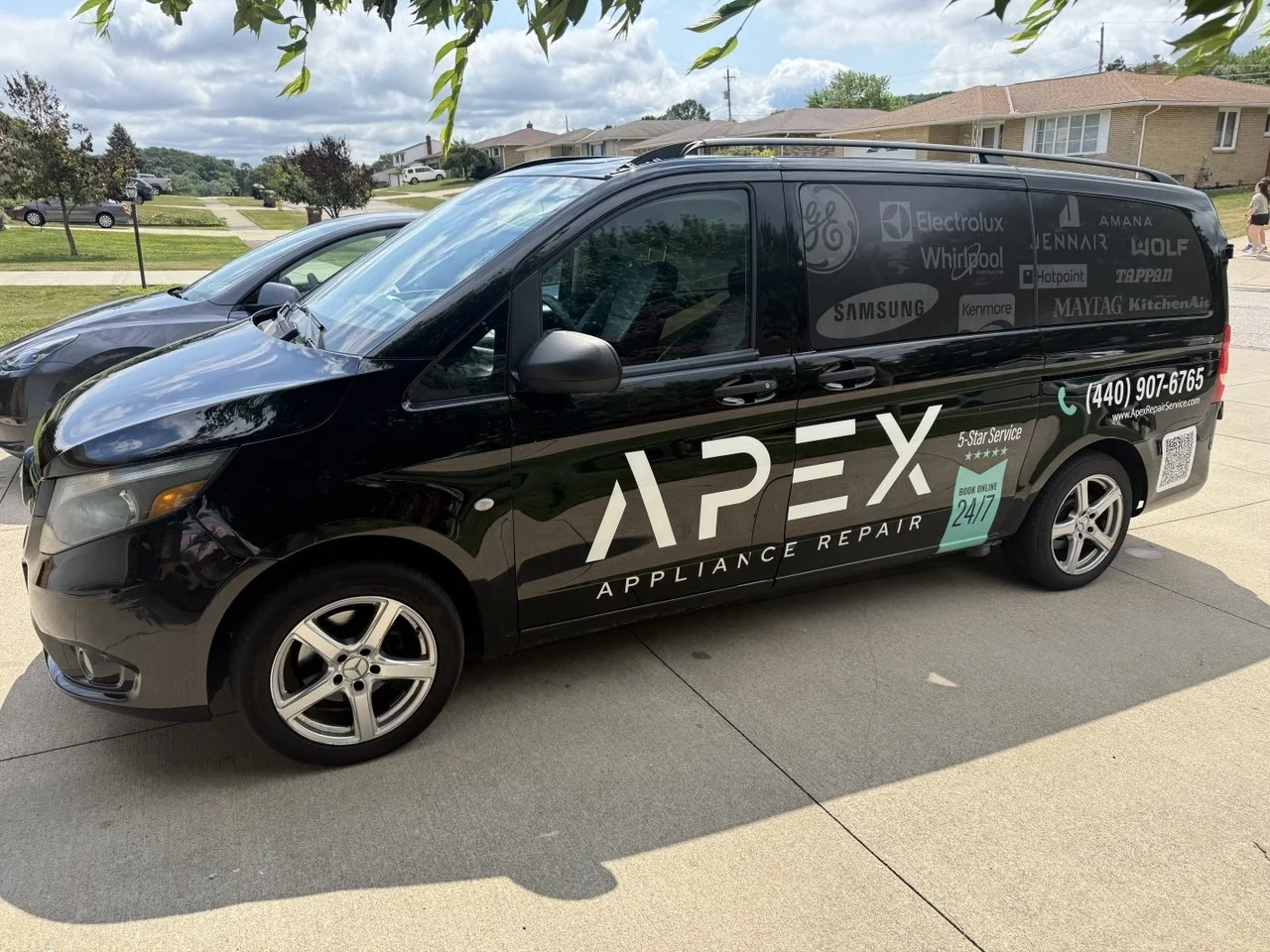 Branded APEX Appliance Repair service van in a Greater Cleveland neighborhood